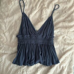 Size small brand new blue flowy tank